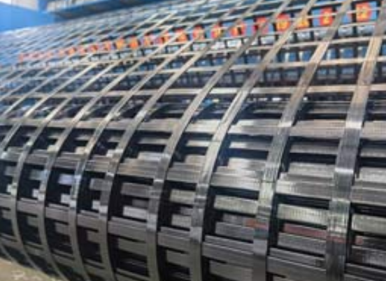 丰城钢塑土工格栅：基建“隐形脊梁”的绿色智造与长寿命进化论